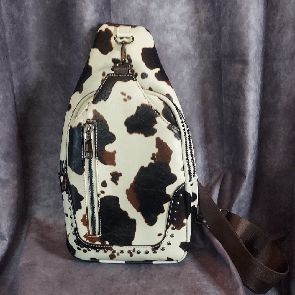 LNWOT Sam and Hadley Studded Cow Print Sling Backpack Faux Leather Brown White